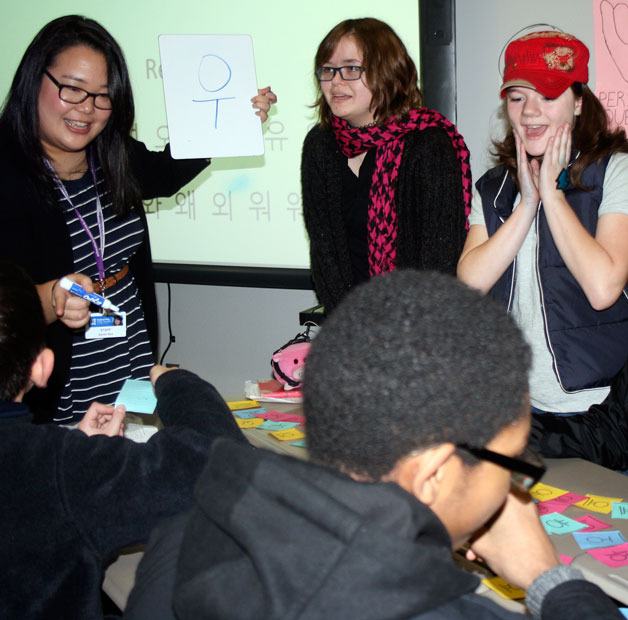Sarah Seo teaches Korean to a group of students at Saghalie Middle School recently.