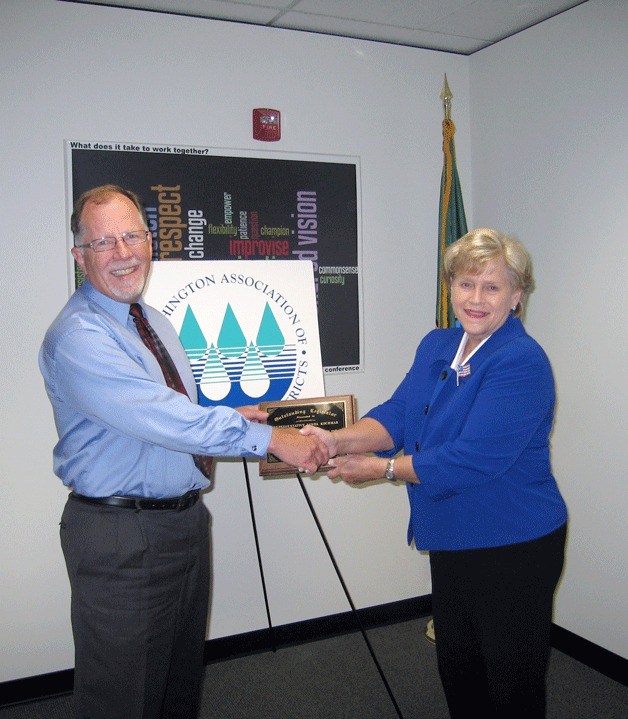 The Washington Association of Sewer and Water Districts recently recognized Rep. Linda Kochmar for her support of special purpose sewer and water districts. The association presented her a plaque at their office in Tukwila on Aug. 25.