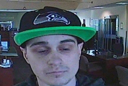 FBI officials believe this suspect pictured in video footage robbed the Federal Way Umpqua bank on Friday.