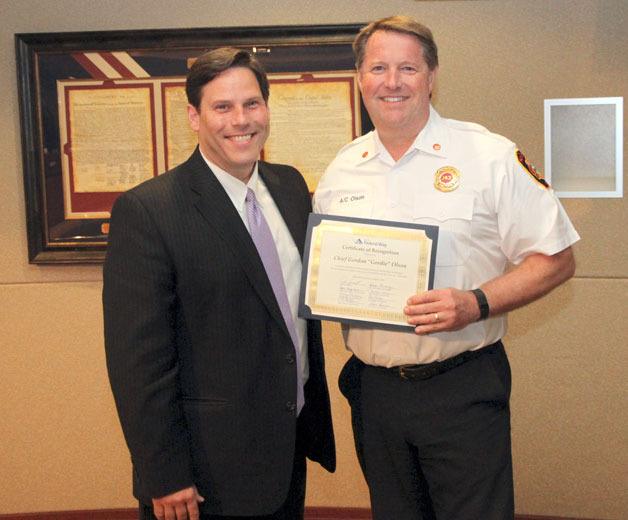 Federal Way Mayor Jim Ferrell and outgoing South King Fire and Rescue Assistant Chief Gordon 'Gordie' Olson.