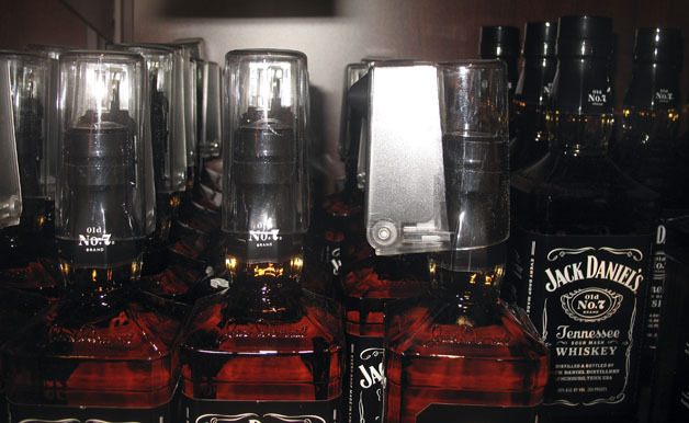 Most stores have anti-theft devices on liquor bottles.