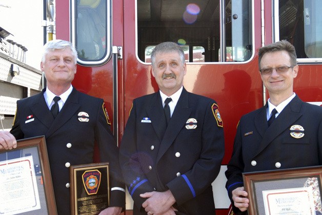 Pictured left to right: Lt. John Riley