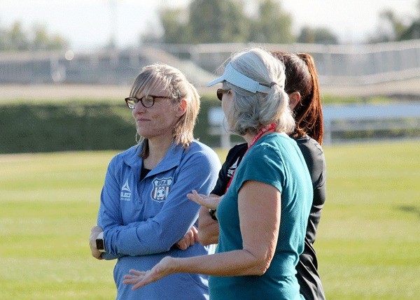Amy Griffin looks on as her team practiced at their first camp in Chula Vista