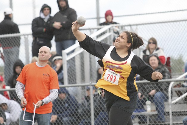 Thomas Jefferson senior Kayla Adams uncorks a throw during the shot put competition at the Class 4A State Track and Field Championships at Mount Tahoma Statdium Friday morning. Adams won the state title with a toss of 45-10 3/4. It was her second title.