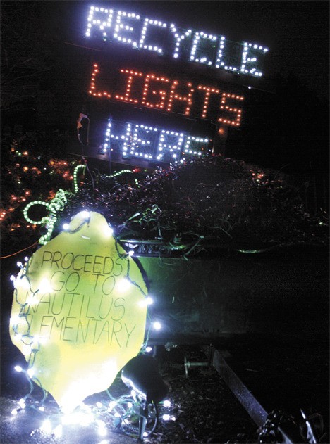 Jessica Lam is collecting light strands for recycling. Proceeds from the lights go toward several local causes. One collection spot is set up in Lam's grandmother's yard. Part of Diane Cole's Christmas yard decorations is a wagon full of lights ready to be recycled. The proceeds from the lights in the wagon will go to Nautilus Elementary School.