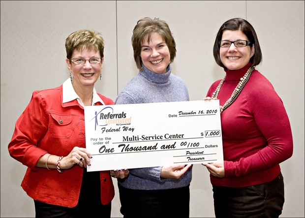 Pictured: Referrals Unlimited president Cindy Ducich with Tricia Schug and Patti Spaulding from the Multi-Service Center.