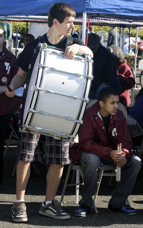Thomas Jefferson High School's marching band helped celebrate the opening day of the Federal Way Farmers Market May 8. Pictured playing the drum is Shaun Rhotehamel
