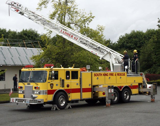 South King Fire and Rescue firefighters test the oldest ladder truck (1981) in the fleet at Station 62 on South 312th Street.