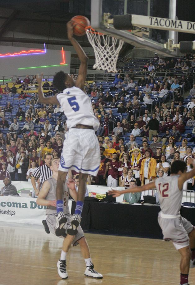 Jalen McDaniels scores for the Eagles during the state quarterfinal game against Moses Lake Thursday.