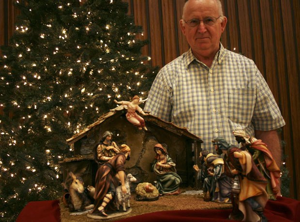 Don Homer sets up the Nativity scenes Thursday at The Church of Jesus Christ of Latter-day Saints in Federal Way. He lent this display to this weekend’s event.