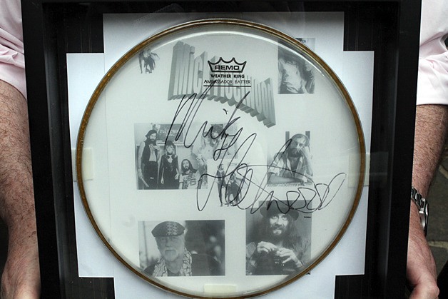 Centerstage Theatre will auction a drumhead autographed by Mick Fleetwood of the legendary band Fleetwood Mac.