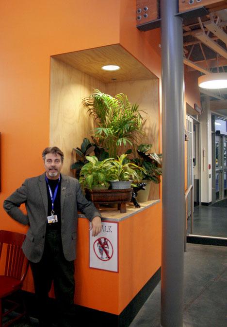 Panther Lake Elementary School principal Tom Capp in front of the 'feng shui' area.