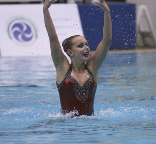 Thomas Jefferson High School student Katie LaBounty performs her solo routine Friday afternoon inside the King County Aquatic Center at the Speedo Junior National Synchronized Swimming Championships . LaBounty and Seattle Synchro teammate