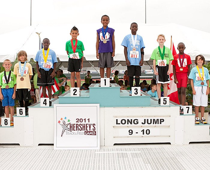 Federal Way 10-year-old Antonio Guity stands atop the podium after winning the national championship in the standing long jump last weekend at the 2011 Hershey's Track & Field Games in Pennsylvania.