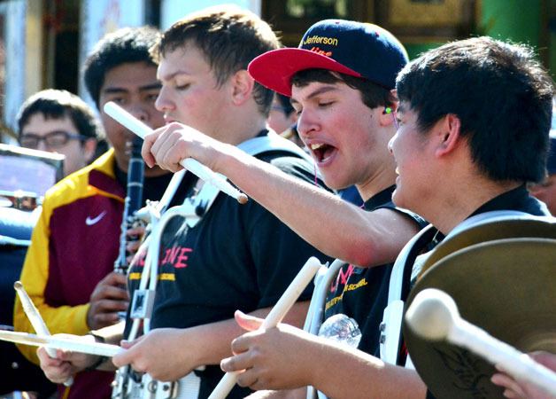 Pep bands and drum lines from Todd Beamer and Thomas Jefferson high schools provide warm up tunes during the Federal Way Farmers Market's opening ceremony on Saturday.