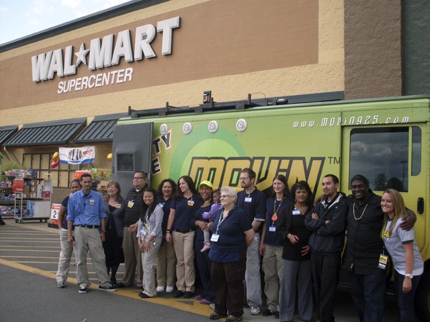 The R. Place of Refuge volunteer team joined Federal Way Super Wal-Mart for the annual Back to School Drive hosted Aug. 14 with the Movin 92.5 radio station.