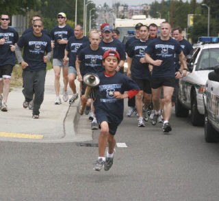 Law Enforcement Torch Run for Special Olympics runners