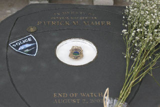 A memorial for fallen Federal Way police officer Patrick Maher was dedicated Aug. 2 in front of City Hall. Officer Maher died in the line of duty five years ago from a gunshot wound to the abdomen after intervening in a dispute among three individuals in a convenience store parking lot. The suspect pleaded guilty to the crime and was sentenced to 30 years in prison.
