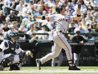 Federal Way High School graduate Travis Ishikawa was called up to the San Francisco Giants on Wednesday after hitting a combined .299 with 24 homers and 99 RBIs in the minor leagues.
