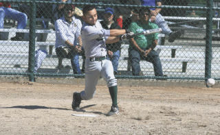The Seattle Bulldogs’ Art Ruiz hits a grounder during a C Division game of the 2008 Gay Softball World Series Wednesday at Celebration Park. The Bulldogs