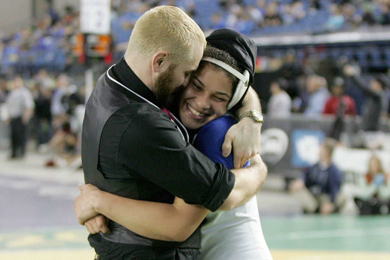Thomas tears MCL at state wrestling tourney, out for softball season