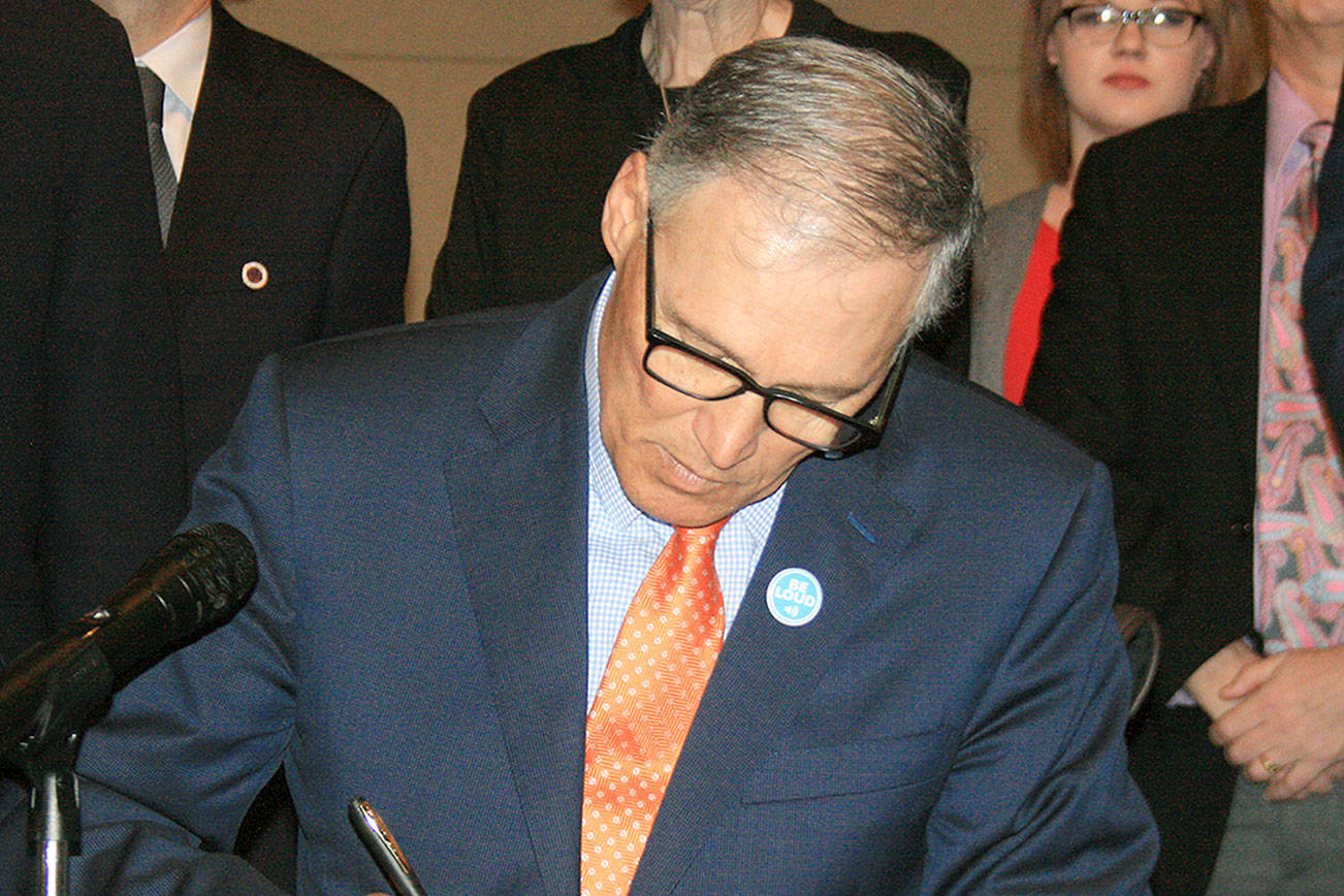 Gov. Inslee signs bills improving protection for sex assault, trafficking at Federal Way City Hall Friday