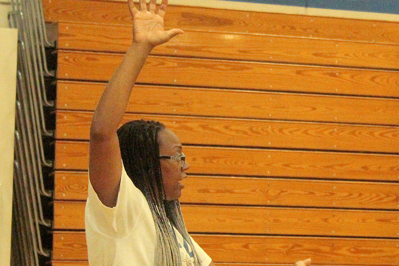 Eagle volleyball coach Walker’s work off the court leading to big gains
