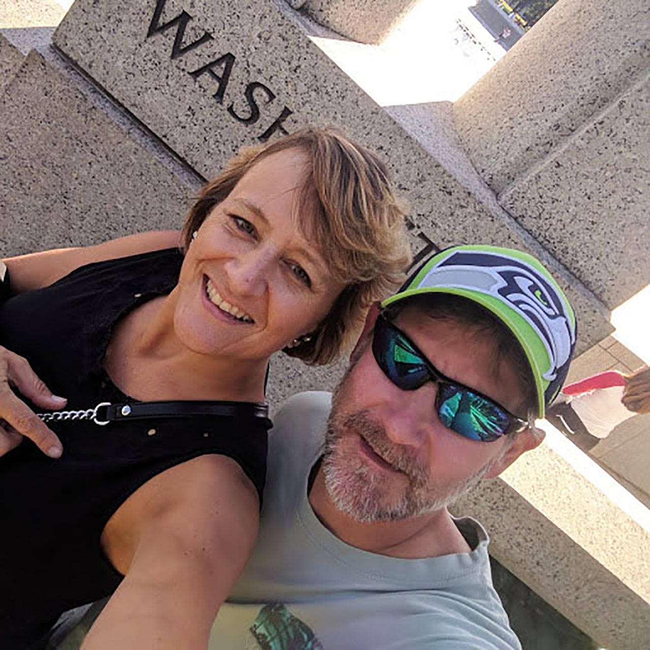 Michael-Ann McAboy and her husband, Mike, in front of the Washington state statue at the World War II Memorial during their September trip to Washington, D.C. 
Contributed Photo