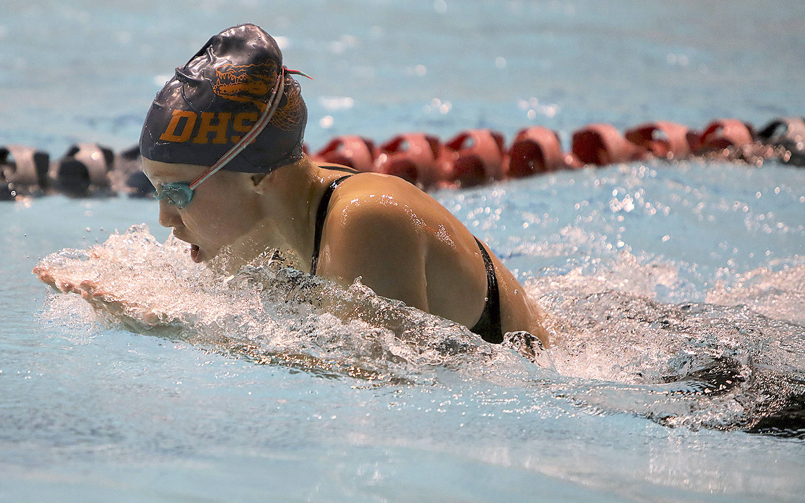 Decatur freshman Lilly Tucker competes in the 100-yard breaststroke at the 4A state swim tournament, Nov. 11 at the Weyerhaeuser King County Aquatic Center. Tucker placed seventh in the state in the event, finishing in 1 minute, 8.11 seconds. Courtesy Tracy Arnold