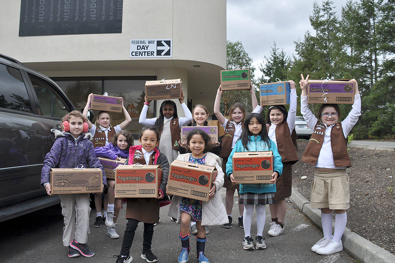 Girl Scout troop donates cookies to Federal Way Day Center