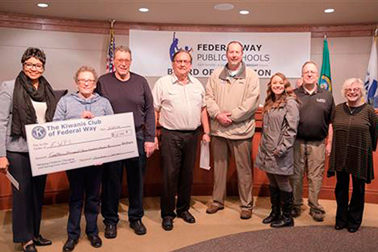 Kiwanis presents check to Federal Way school district