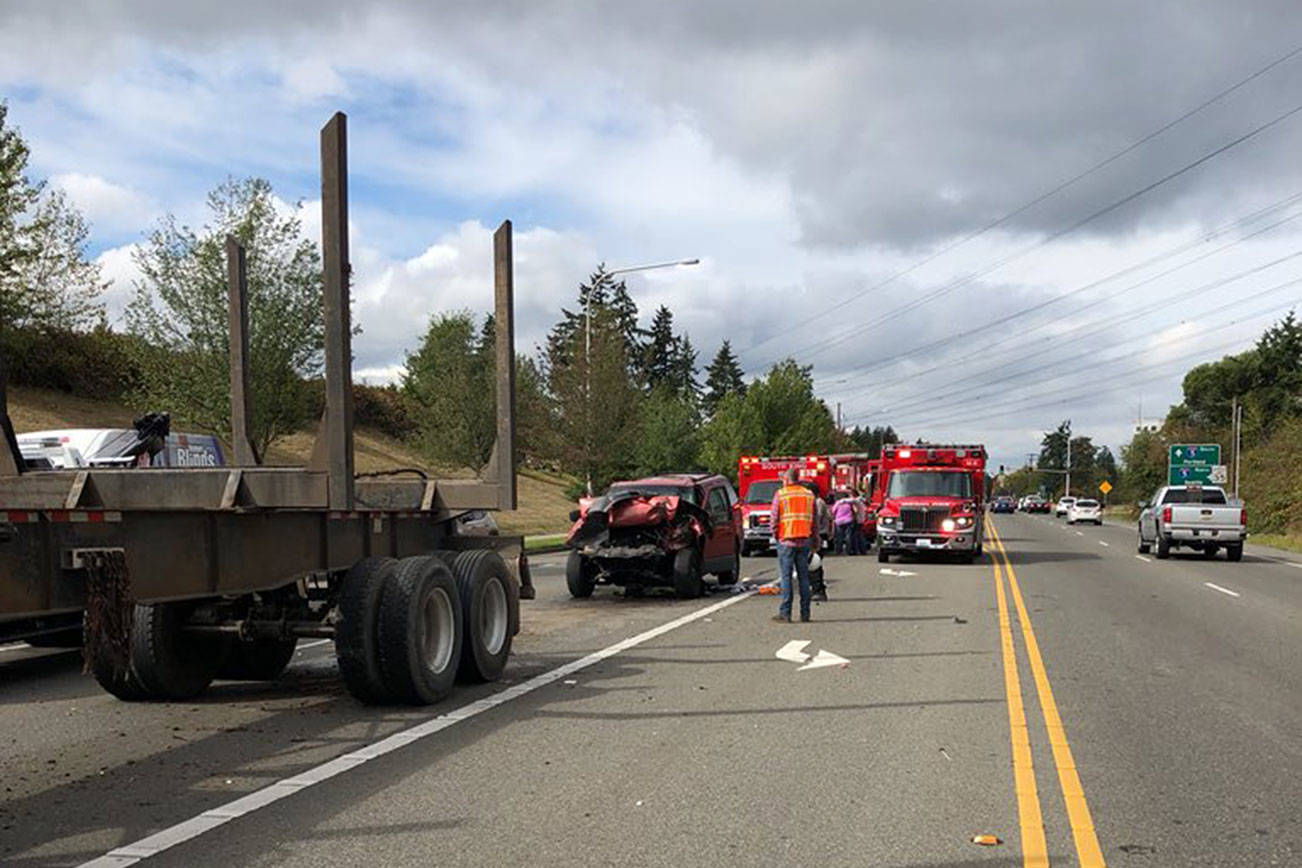 SUV collides with semi truck on 320th in Federal Way
