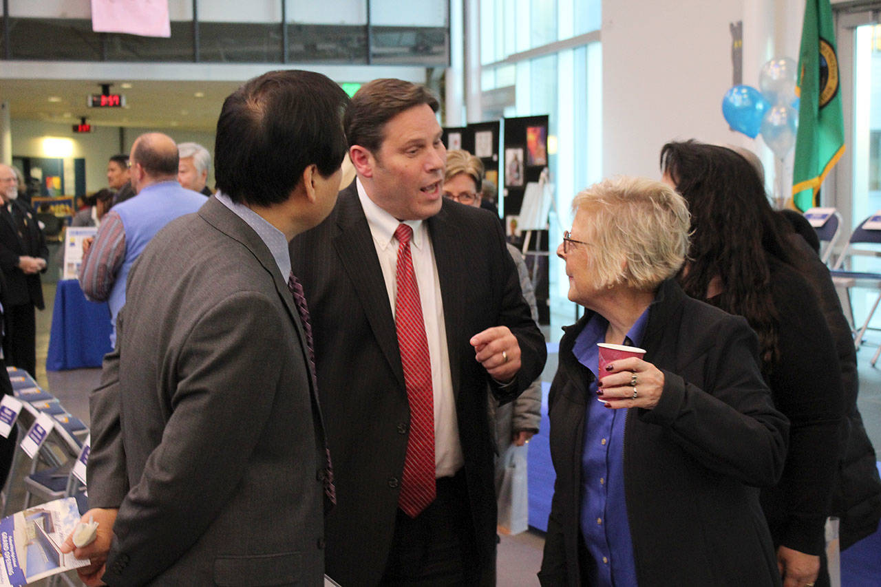 Mayor Jim Ferrell, center, and Sen.-elect Claire Wilson. Olivia Sullivan/staff photo