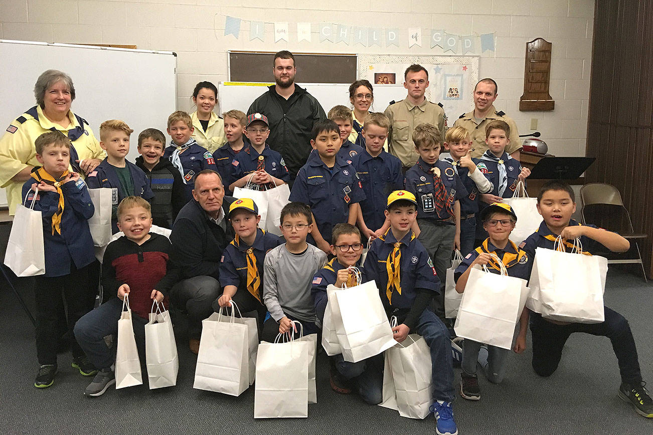 Cub Scouts provide scarfs, items for homeless in Federal Way