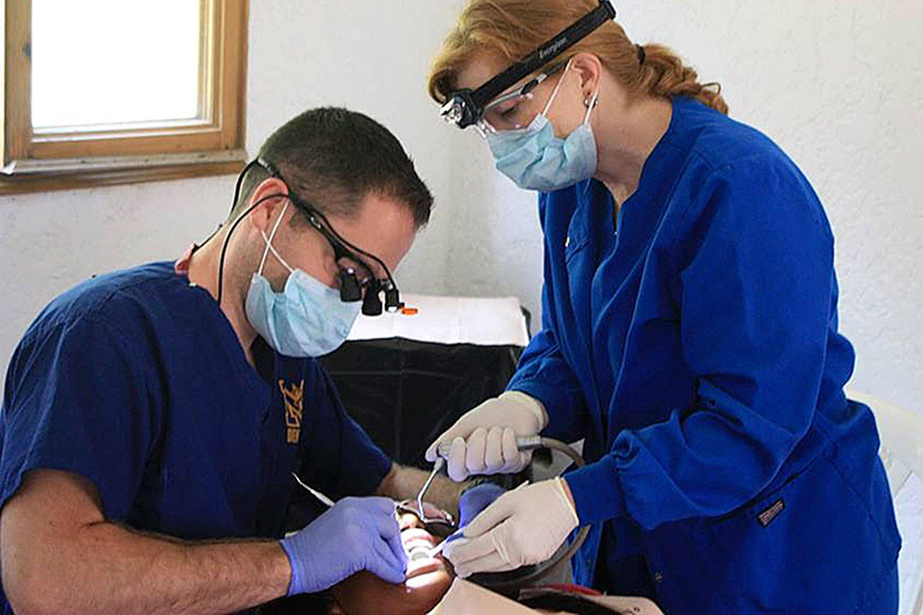 Dr. Shoop spreads smiles around the globe