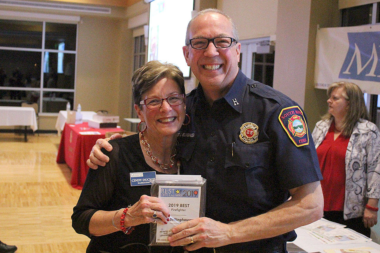 Capt. Jeff Bellinghausen, community affairs officer for South King Fire & Rescue, won best firefighter. Olivia Sullivan/staff photo