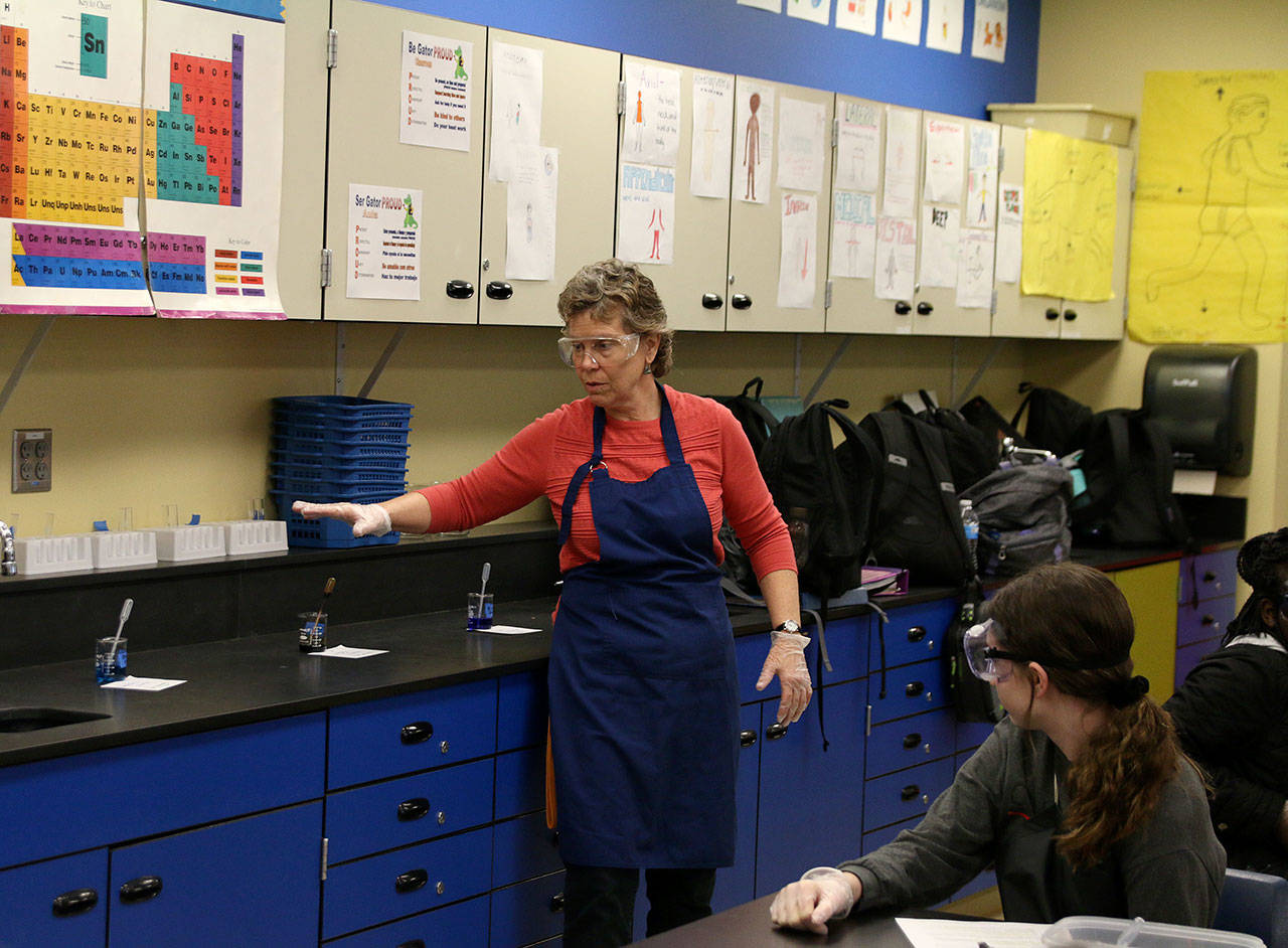 Jeanette Kearney explains the lab directions at a recent biomedical class. Olivia Sullivan/staff photo