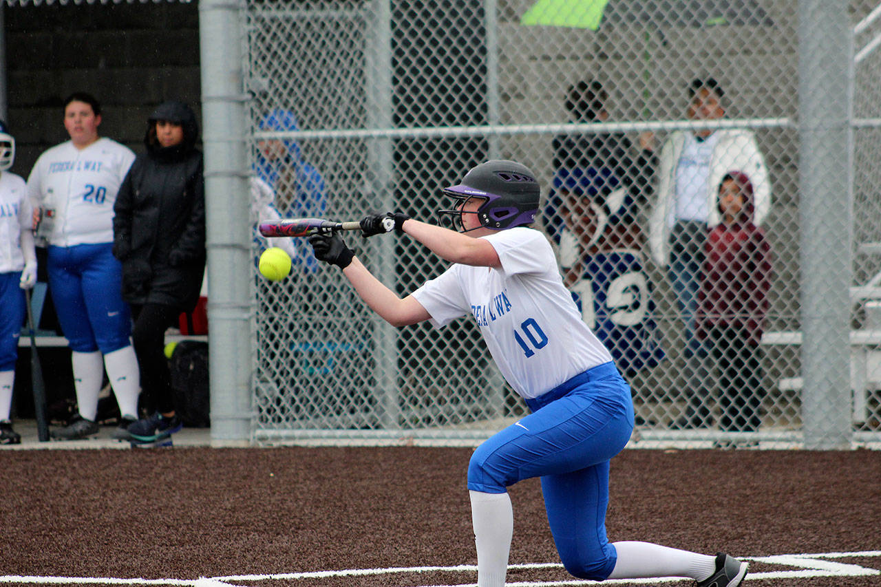 Federal Way’s Emma Wren opts to bunt at bat on Tuesday afternoon. Olivia Sullivan/staff photo