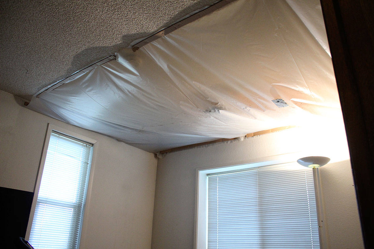 A room inside the Vaughn’s house has only a tarp as a cover due to their damaged roof. Olivia Sullivan/staff photo