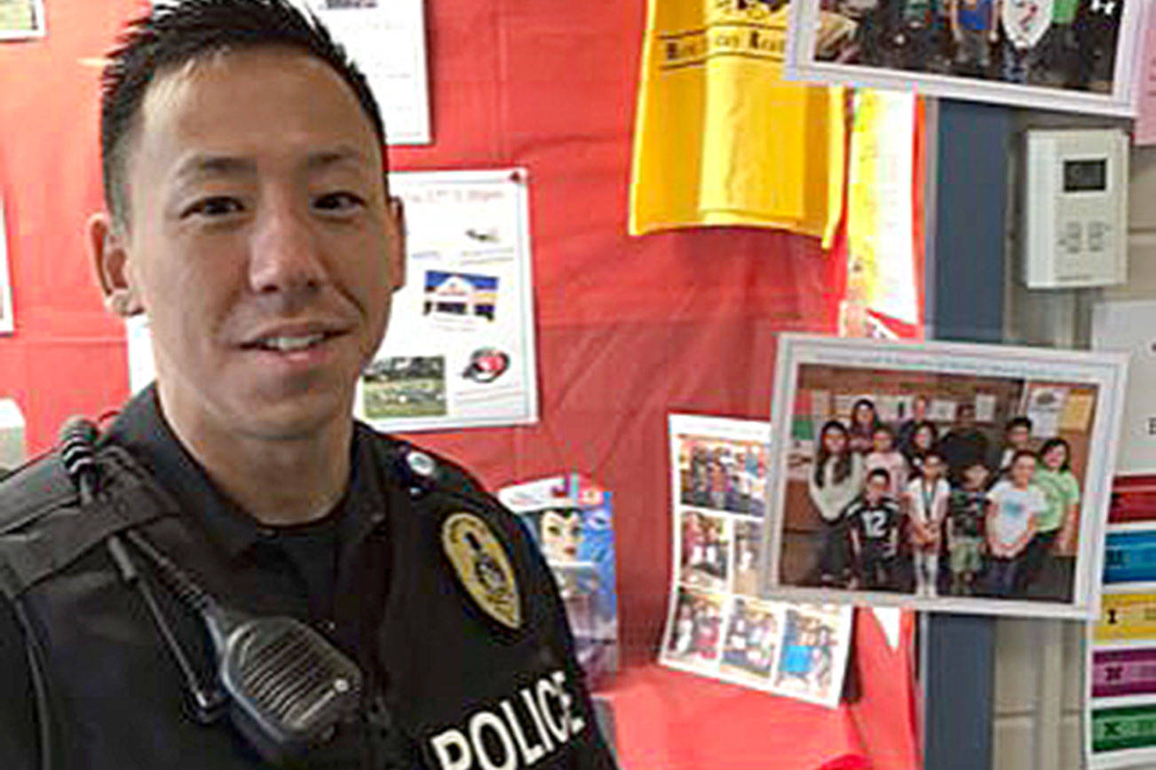 Police officer helps get bikes for students at school where he learned English as new immigrant