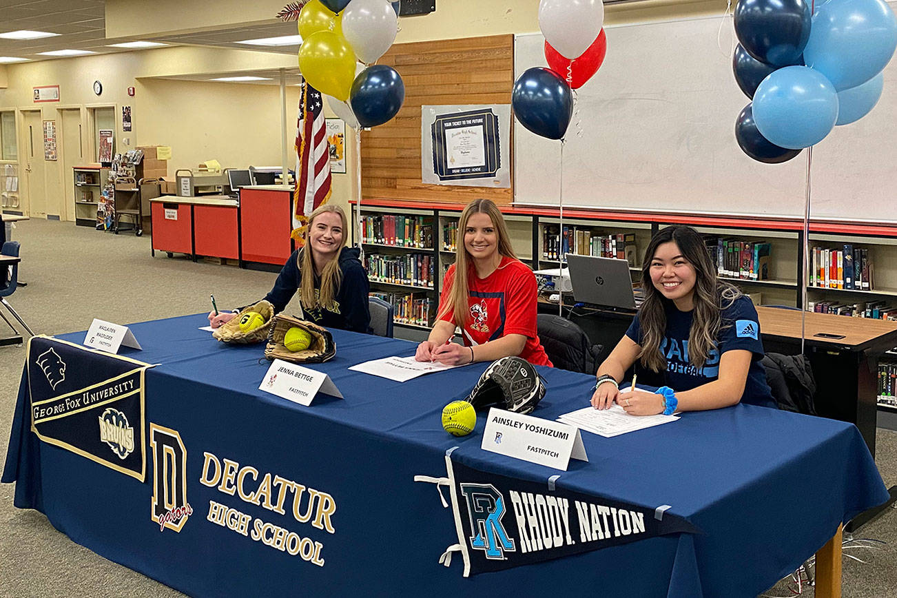 Three Decatur seniors sign National Letters of Intent for softball