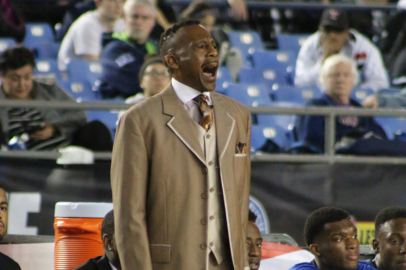 Mirror file photo                                Jerome Collins, shown coaching the Federal Way High School boys basketball team in a 2016 state tournament semifinal game.