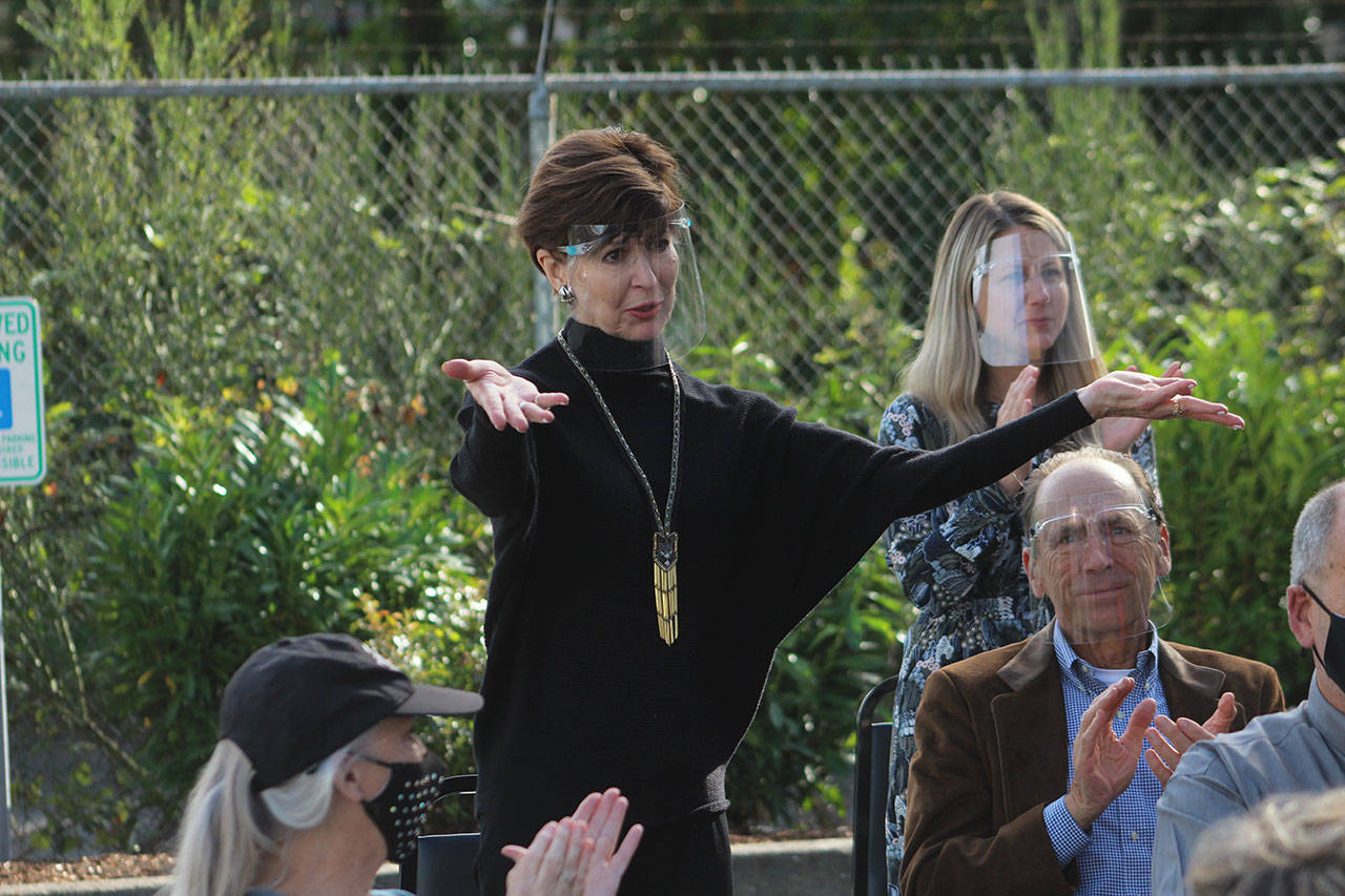 FUSION Founder Peggy LaPorte gestures to the crowd in thanks at the ribbon cutting ceremony on Oct. 8. Olivia Sullivan/the Mirror