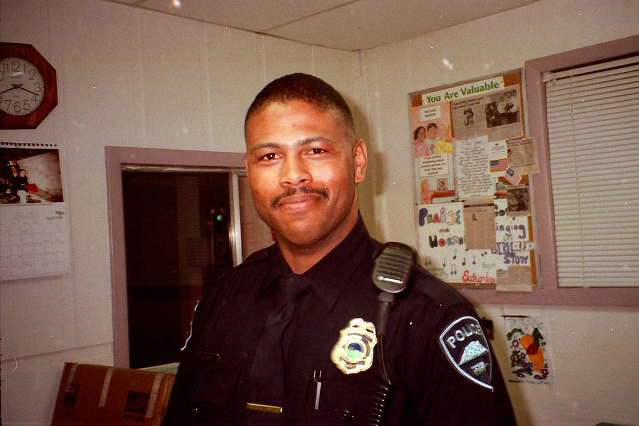 Lt. Michael Boutte pictured at the Westway Community Center in Federal Way waiting for the start of an Easter egg hunt in April 1998. Photo courtesy of FWPD Deputy Kyle Sumpter