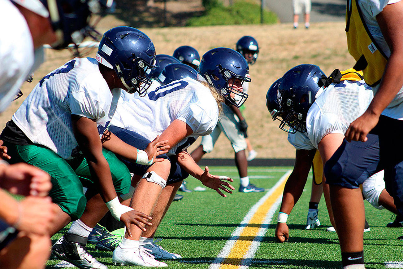The Todd Beamer Titans football team in Federal Way during a 2019 summer practice. Olivia Sullivan/the Mirror
