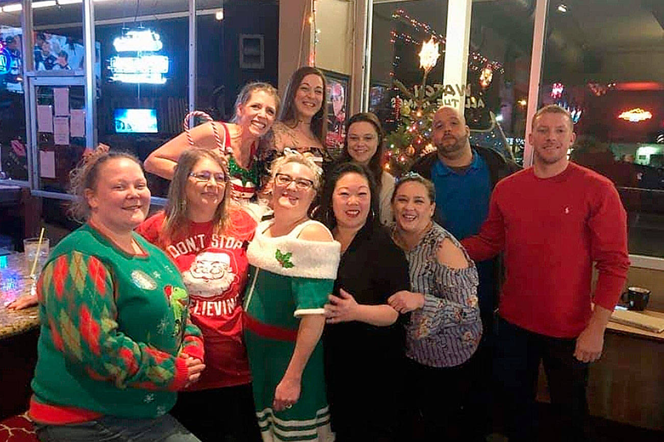 Most of the Brickyard Pub staff members pictured at the bar's Christmas party in 2017. Photo courtesy of Celeste Locke