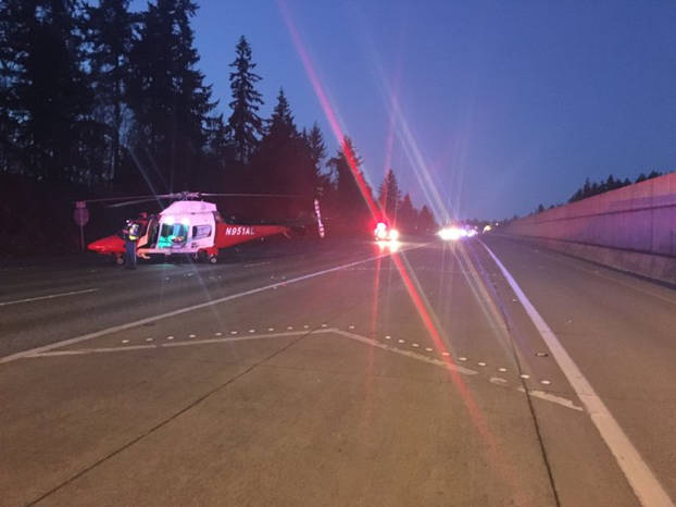 Airlift Northwest landed on I-5 South near Federal Way on April 5, shutting down all southbound lanes. Photo courtesy of Washington State Patrol