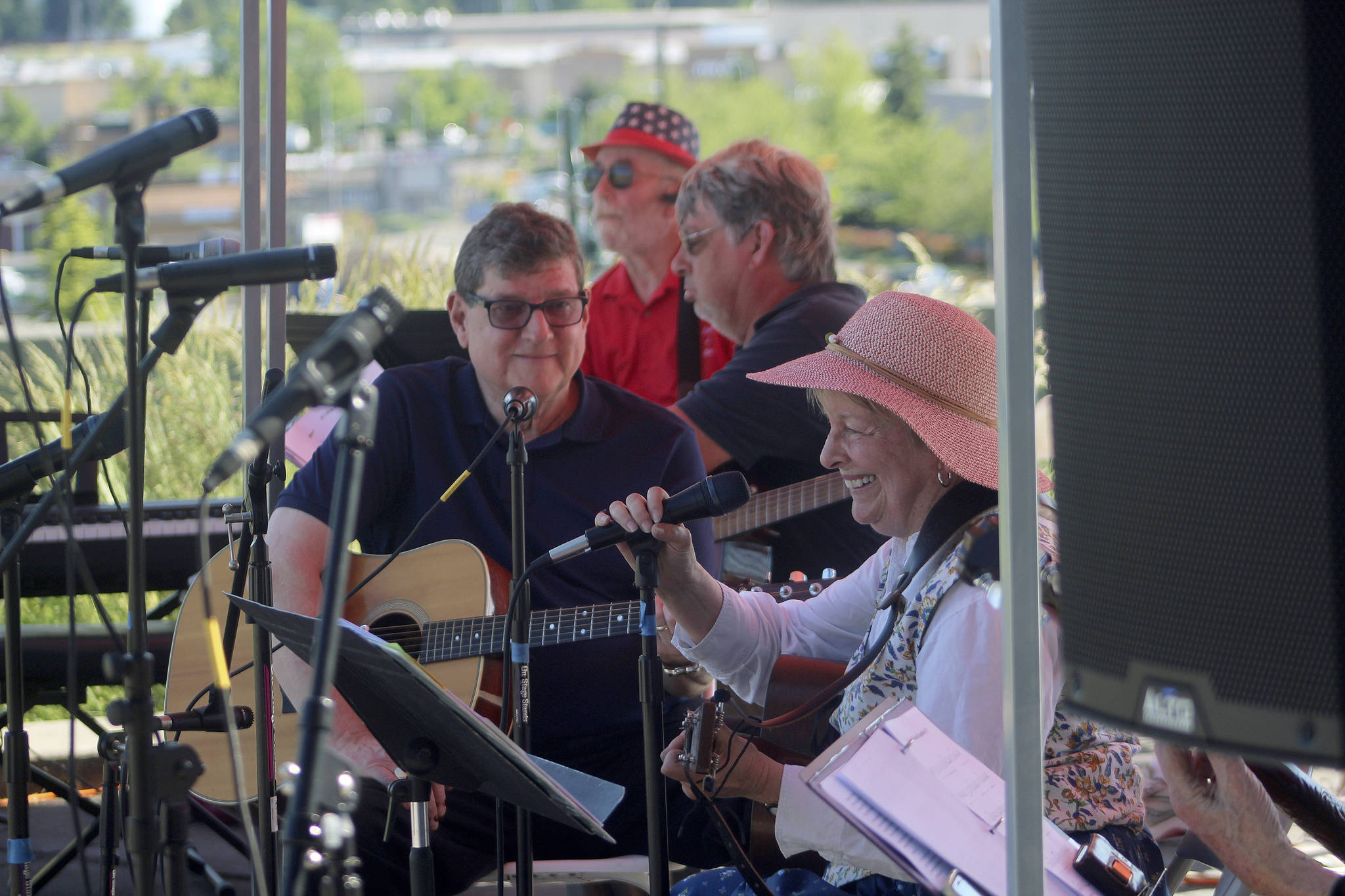 Make Music Project Manager Jan Barber, front right, smiles as she plays with the Marine Hills Folk Jam. Olivia Sullivan/the Mirror