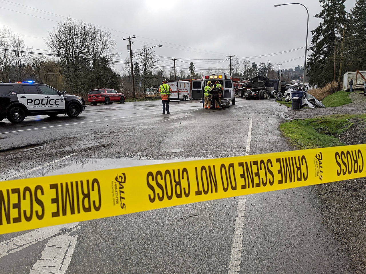 Photo courtesy of South Sound News
Police closed off the roadway in the 37300 block of Pacific Highway S. while they investigate a fatality three-vehicle crash in June.
