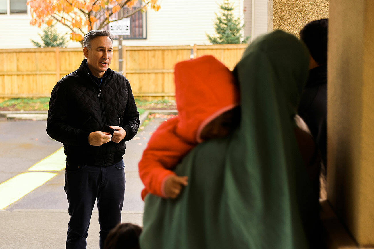 King County Executive Dow Constantine welcomes Afghan families to Federal Way in mid-October. Courtesy photo